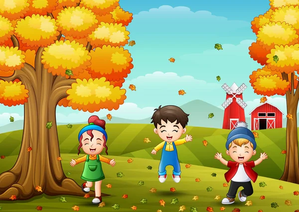 Щасливі діти грають з осіннім листям — стоковий вектор
