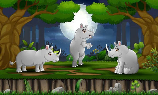 Dessin Animé Trois Rhinocéros Appréciant Forêt Nocturne — Image vectorielle