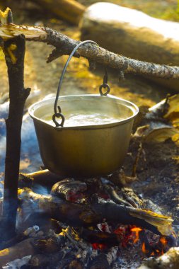Çorba alan koşullarında yanıyor pişirilir.