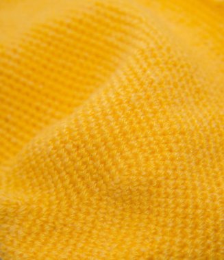 Fotoğrafı yakın çekim sarı ceket ilgili el kitabı.