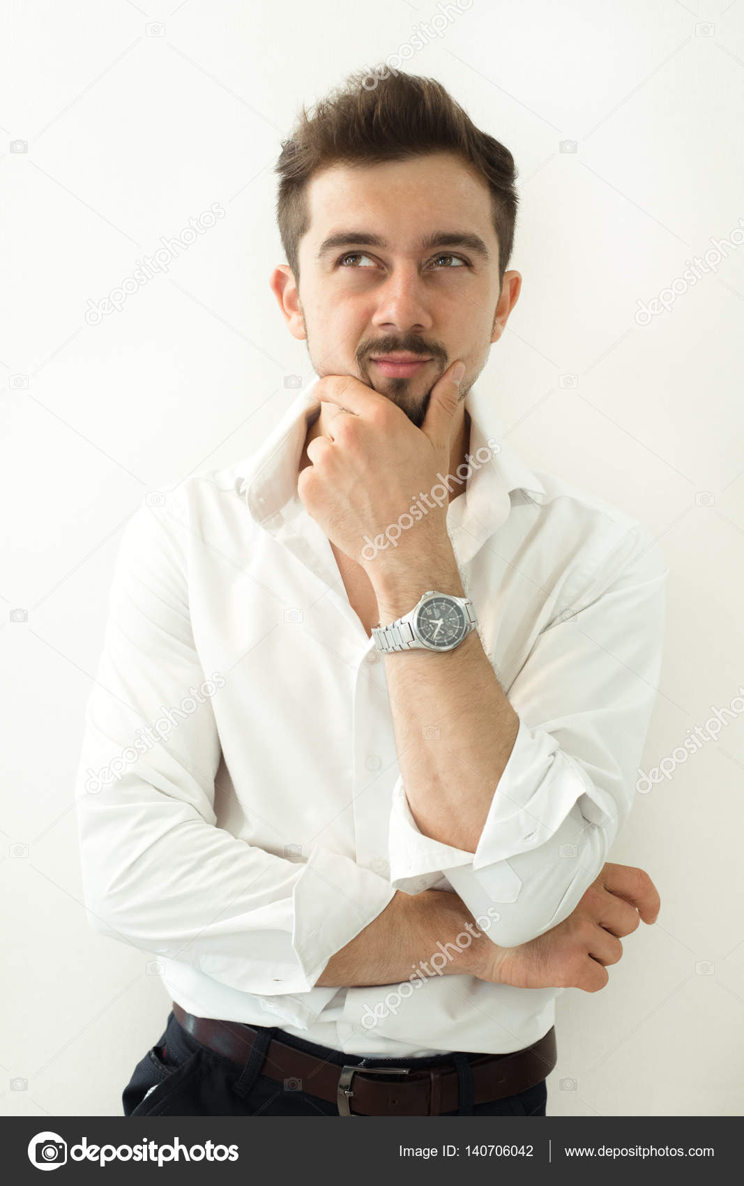 Thinking handsome man think about something standing