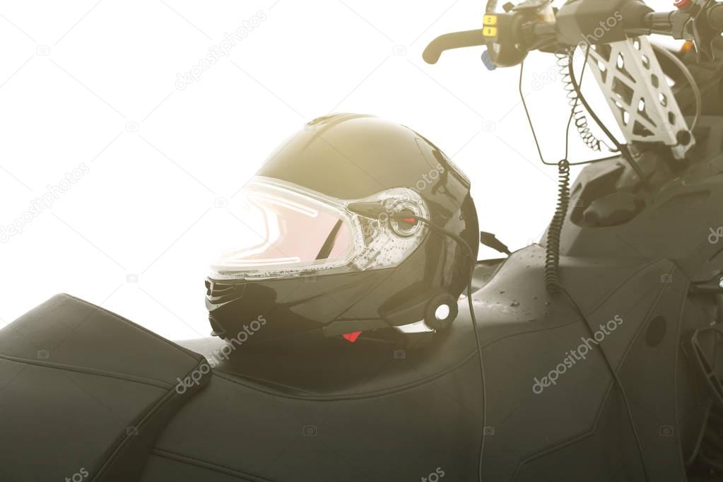 Conceptual image. Snowmobile. The concept of vacation during the winter holidays