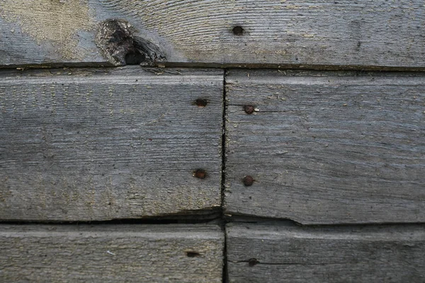 Gamla brädor bakgrunder. gamla trähus vägg — Stockfoto