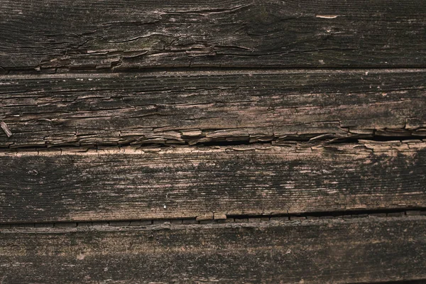 古い木の板の背景。古い木造の家の壁 — ストック写真