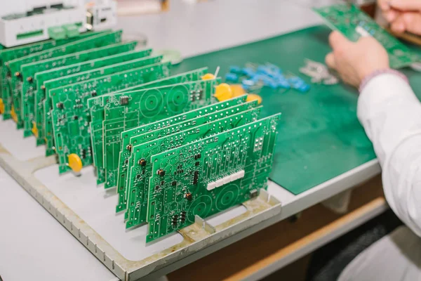 Boards are in a row. Factory for the production of chips. computer board — Stock Photo, Image