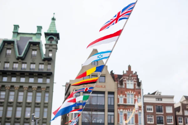 Flaggor från olika länder i Nederländerna — Stockfoto