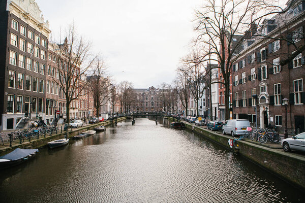 Amsterdam, Netherlands, January 2, 2017: the views of traditional houses in Holland. European style houses. Channels