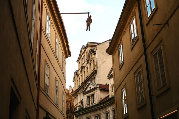 Art object of art in Prague. Hanging on the facade of the house
