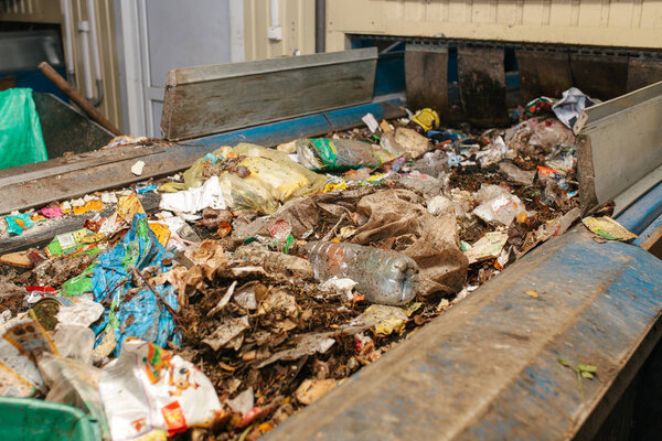 Waste processing plant. Technological process. Recycling and storage of waste for further disposal. Business for sorting and processing of waste.