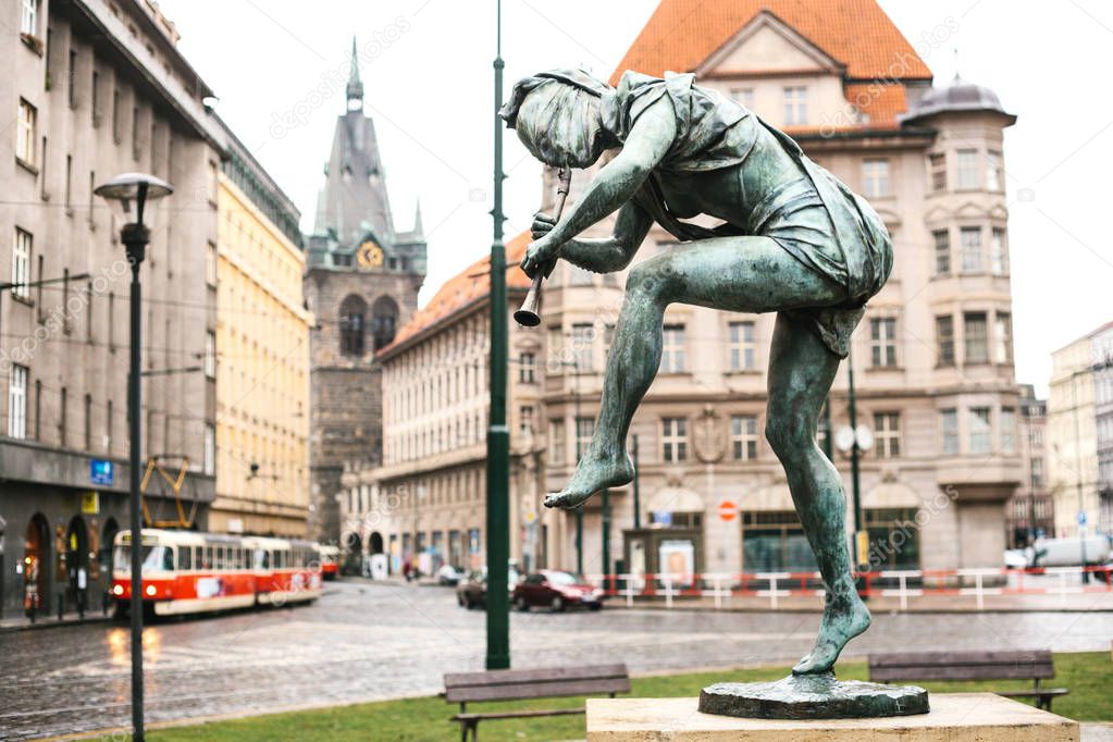 One of the statues of the dancing fountain Czech musicians in the city of Prague, Europe. Each of the dancing sculptures is a world river. Sculpture with a flute is the Amazon river.