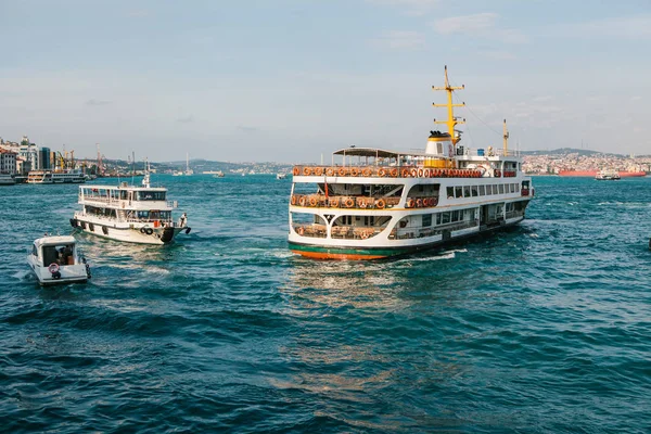 Transportation of local residents and tourists by sea via the Bosphorus in Istanbul. Scenic panoramic view. Travel, rest, vacation.