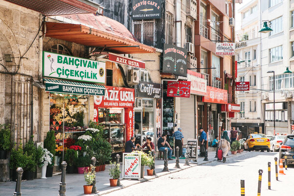 Editorial image of shopping district with various shops and restaurants in Istanbul, Turkey on June 15, 2017. Sultanahmet district