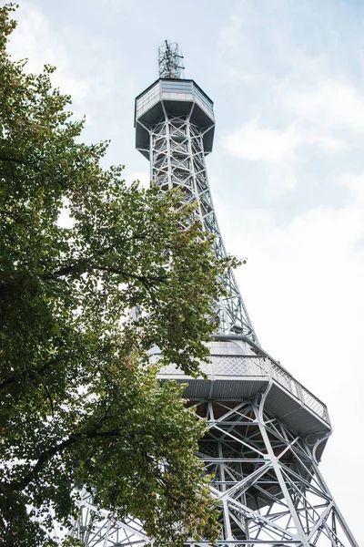 The tower at Petrin Hill is a copy of the world famous Efel Tower in Paris in France. It is one of the observation platforms of the city for tourists. — Stock Photo, Image