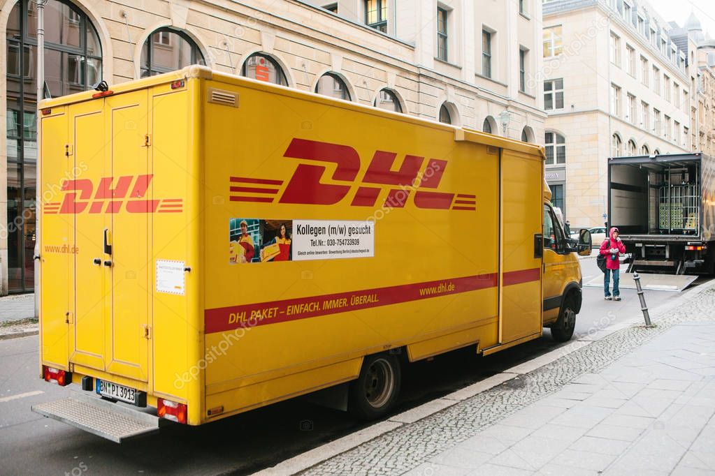 Berlin, Germany 15 February 2018: DHL and German international company or leader of the world logistic market. Courier service for mail transportation
