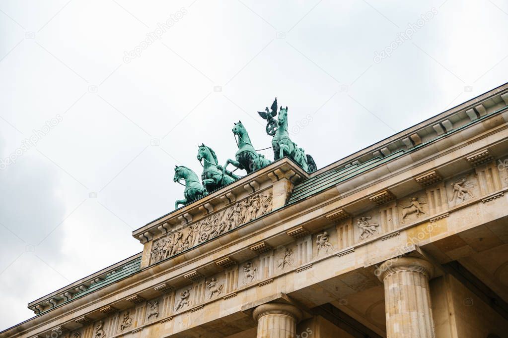 Brandenburg gate in Berlin, Germany or Federal Republic of Germany. Architectural monument in historic center of Berlin. Symbol and monument of architecture.