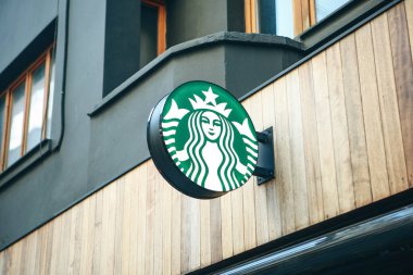Turkey, Istanbul, December 29, 2019: Starbucks coffee sign at the entrance. clipart