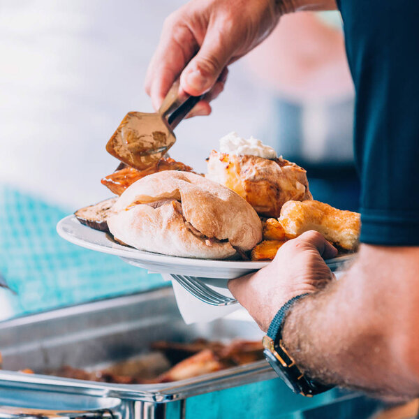 Man Tongues Putting Meat Plate Burger Bun — Stock Photo, Image