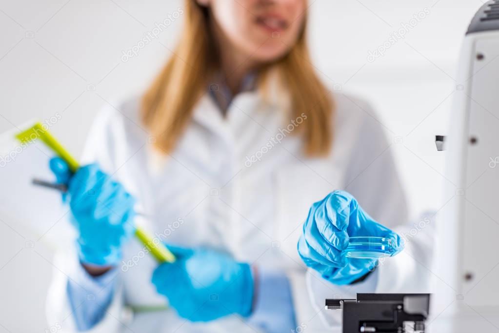  Biotechnology. Female scientist working in laboratory