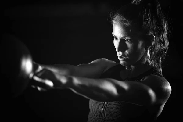Woman Athlete Exercising Kettlebell Indoors — Stock Photo, Image