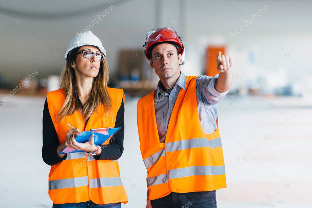 Maintenance Engineers on construction site 