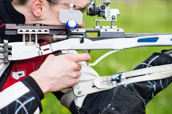 Male training sport shooting with free rifle