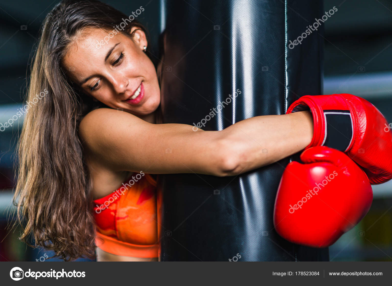 Woman Boxing Training Punching Bag Stock Photo by ©microgen 178523084