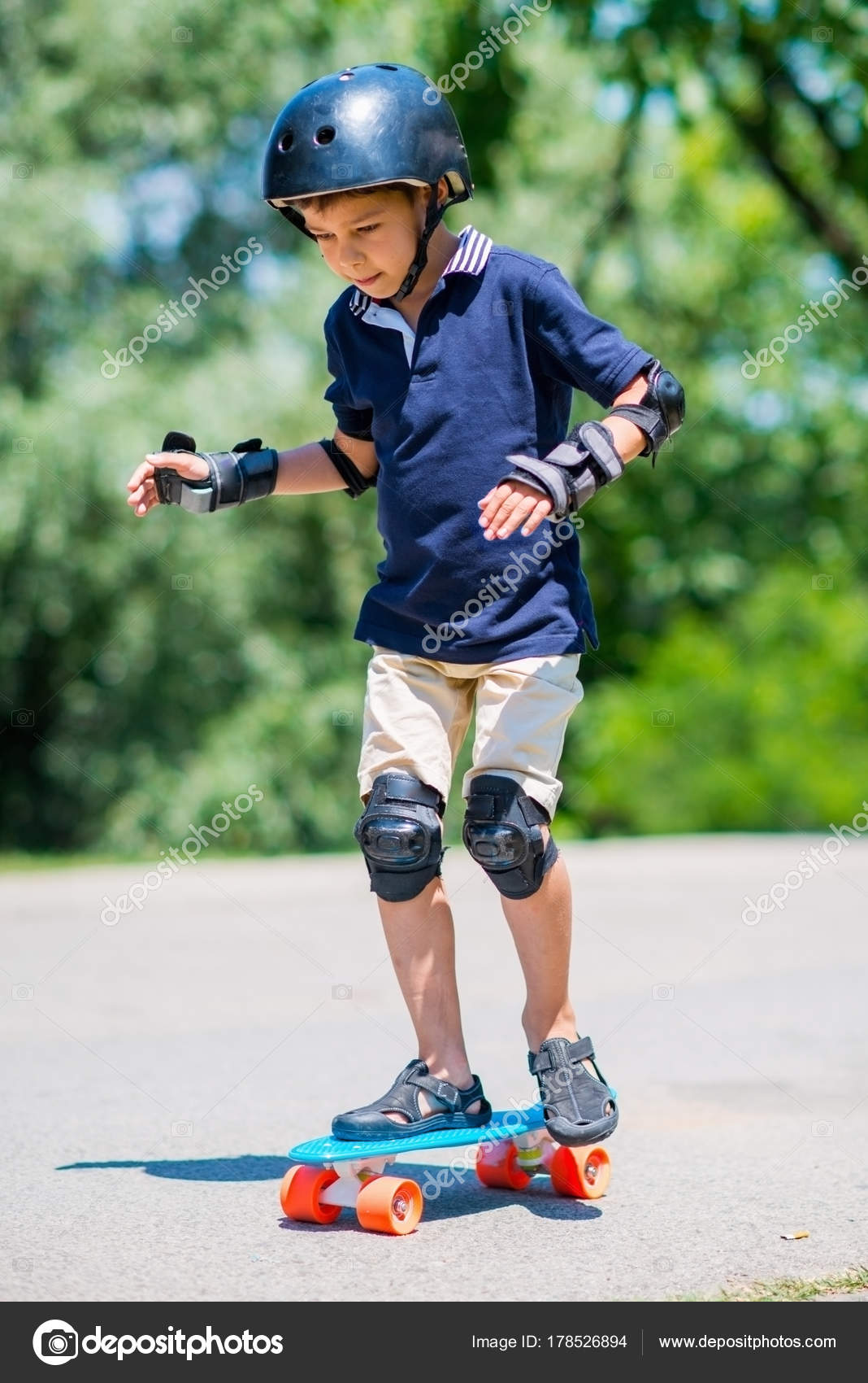 Little Boy Skateboard Stock Photo by ©microgen 178526894