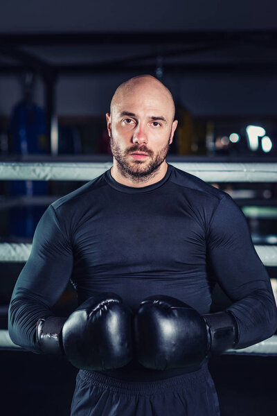 Man on boxing training in the ring 