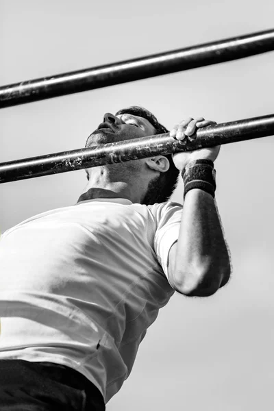 Male Doing Pull Ups Cross Competition — Stock Photo, Image