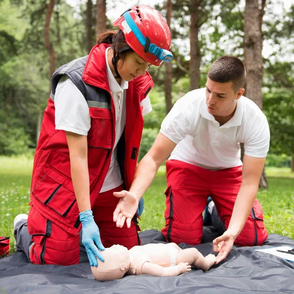 Cpr Practice Woman Man Cpr Baby Dummy Outdoors — Stock Photo, Image