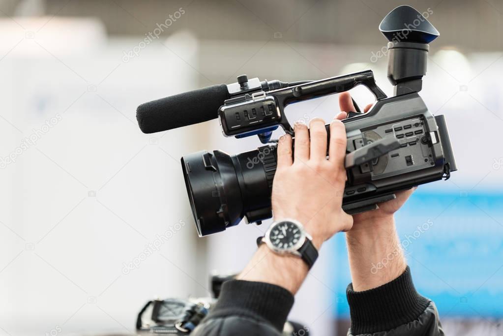 reporter Recording with tv camera