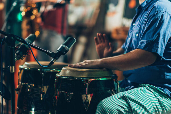 Percussionist playing drums on concert