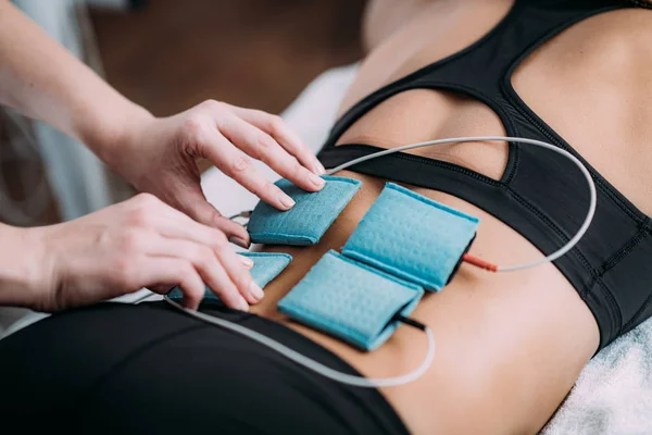 Tens Transcutaneous Electrical Nerve Stimulation Physical Therapy Therapist Positioning Electrodes — 스톡 사진