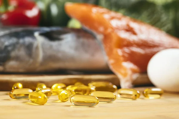 Omega 3 supplements.  Gel capsules and natural sources of omega 3, fatty acid supplements