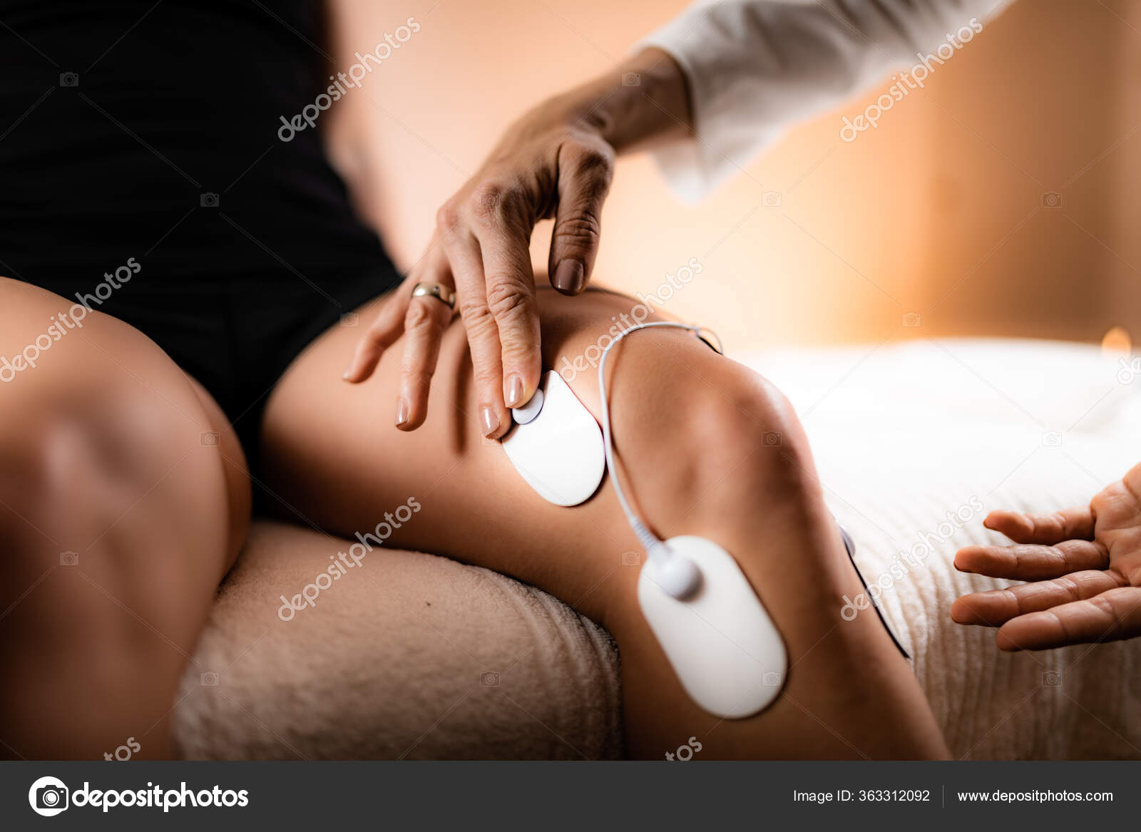 Lower Back Physical Therapy with TENS Electrode Pads, Transcutaneous  Electrical Nerve Stimulation Stock Photo