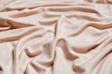 Pastel pembe ipek malzeme yakın çekim arka plan.