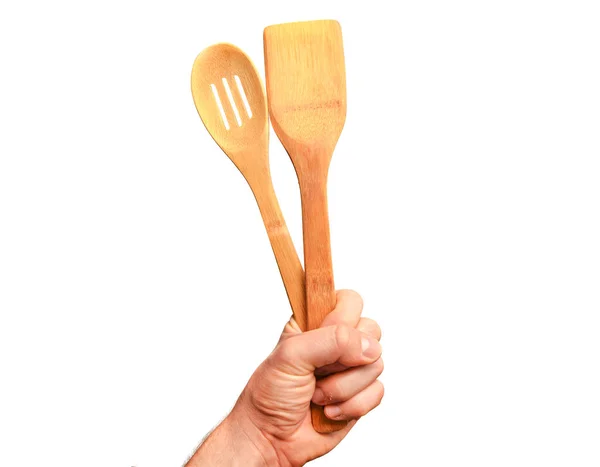 Spatule en bois pour la friture à la main isolée sur fond blanc — Photo