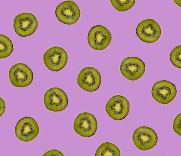 Creative Background Kiwi Slices Purple Surface Top View — Stock Photo, Image