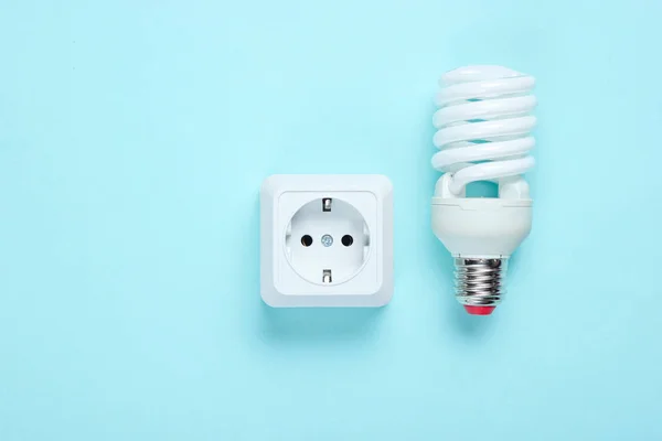 White Plastic Power Socket Spiral Light Bulb Blue Background Minimalism — Stock Photo, Image