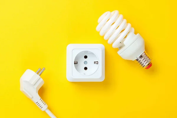 White Plastic Power Socket Power Plug Spiral Light Bulb Yellow — Stock Photo, Image