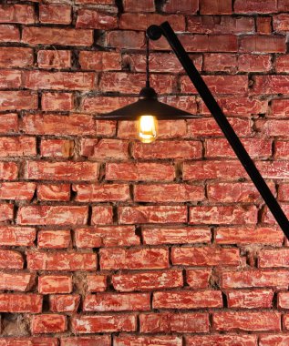 Kırmızı tuğlalı duvar.