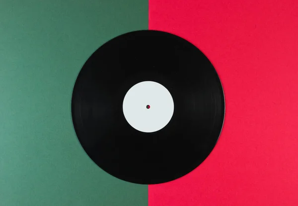 Vinyl Rekord Zöld Piros Háttérrel Retro Stílusban Felülnézet — Stock Fotó