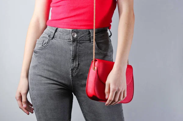 Slim Woman Jeans Shirt Holding Red Bag Gray Background Minimalism — Stock Photo, Image