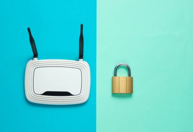 Mavi arkaplana kilitlenmiş kablosuz ağ yönlendirici. Minimalizm. Üst görünüm