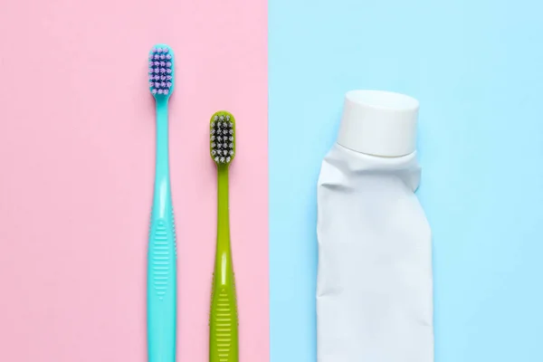 Two Toothbrushes Tube Used Toothpaste Pastel Background Top View — Stock Photo, Image