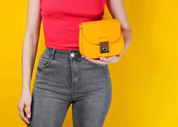 Slim Woman Holding Yellow Leather Bag Yellow Background Crop Photo — Stock Photo, Image