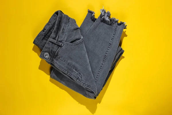Minimalism Fashion Concept Gray Trend Jeans Yellow Background — 스톡 사진