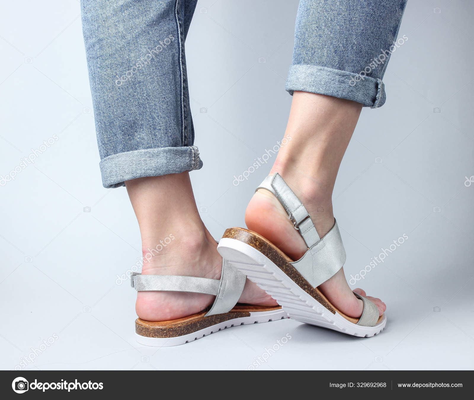 Female Legs Blue Jeans Trendy Leather Sandals Walking White