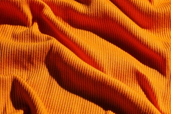 Bakgrund Skrynklig Orange Tyg Struktur Närbild — Stockfoto