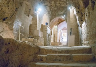 Matera, the town of rhe Sassi, prehistoric troglodyte settlement clipart